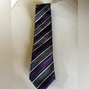 Canali tie in black and purple stripe.